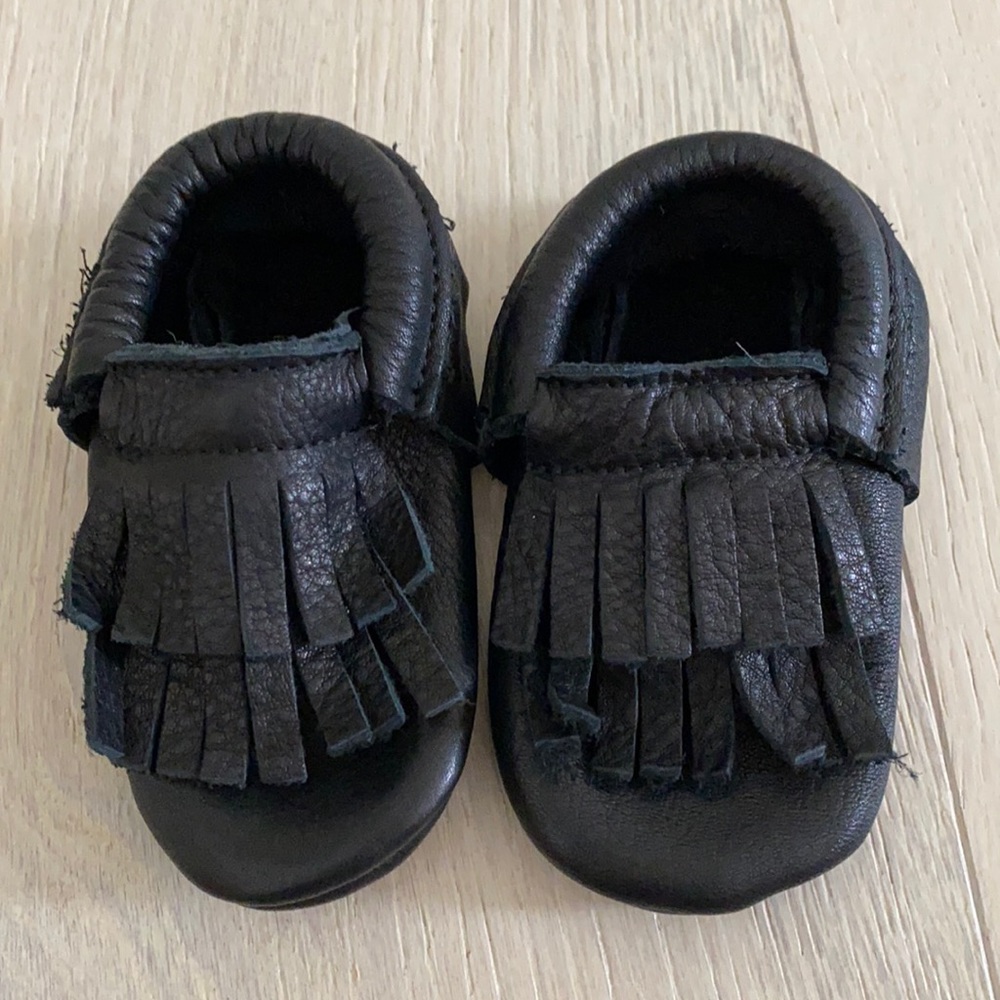Black leather baby shoe